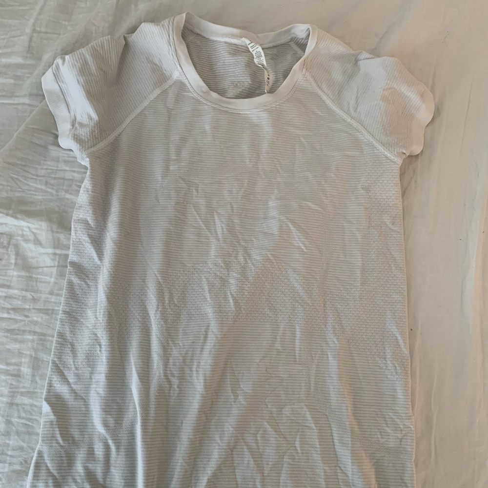 white lululemon athletic shirt